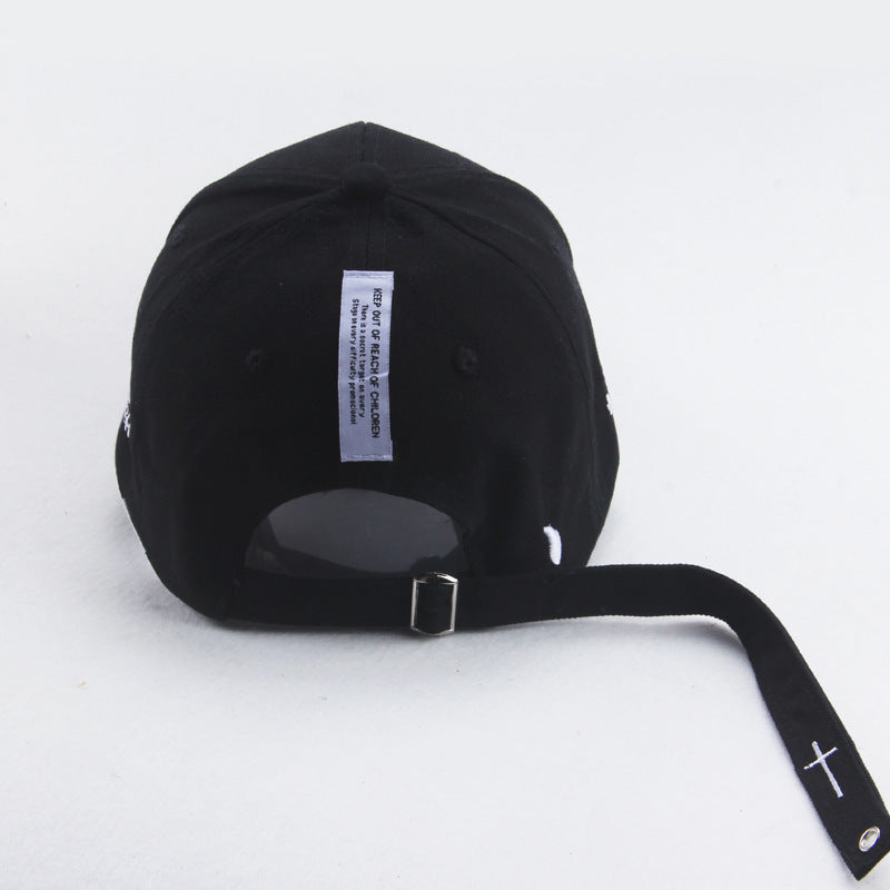 VANIRA — Embroidered Cross Cap with Adjustable Strap